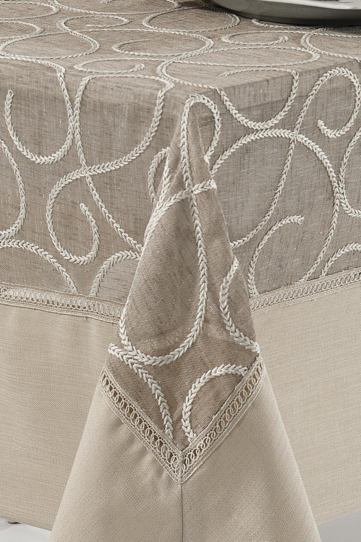 Beige patterned tablecloth and matching napkins for modern living room decor.