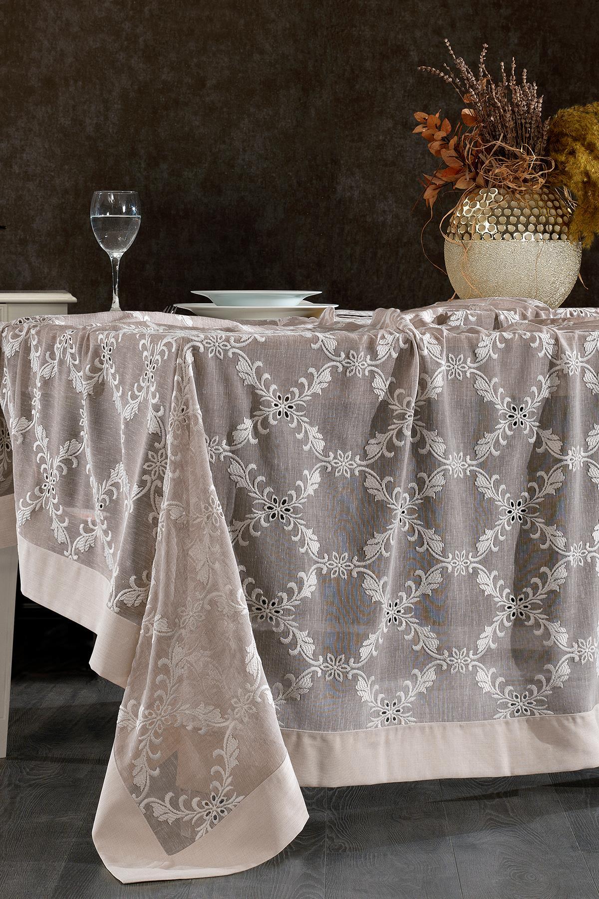Stain-resistant, easy-care, stylishly patterned tablecloth for decorative presentation on modern dining tables